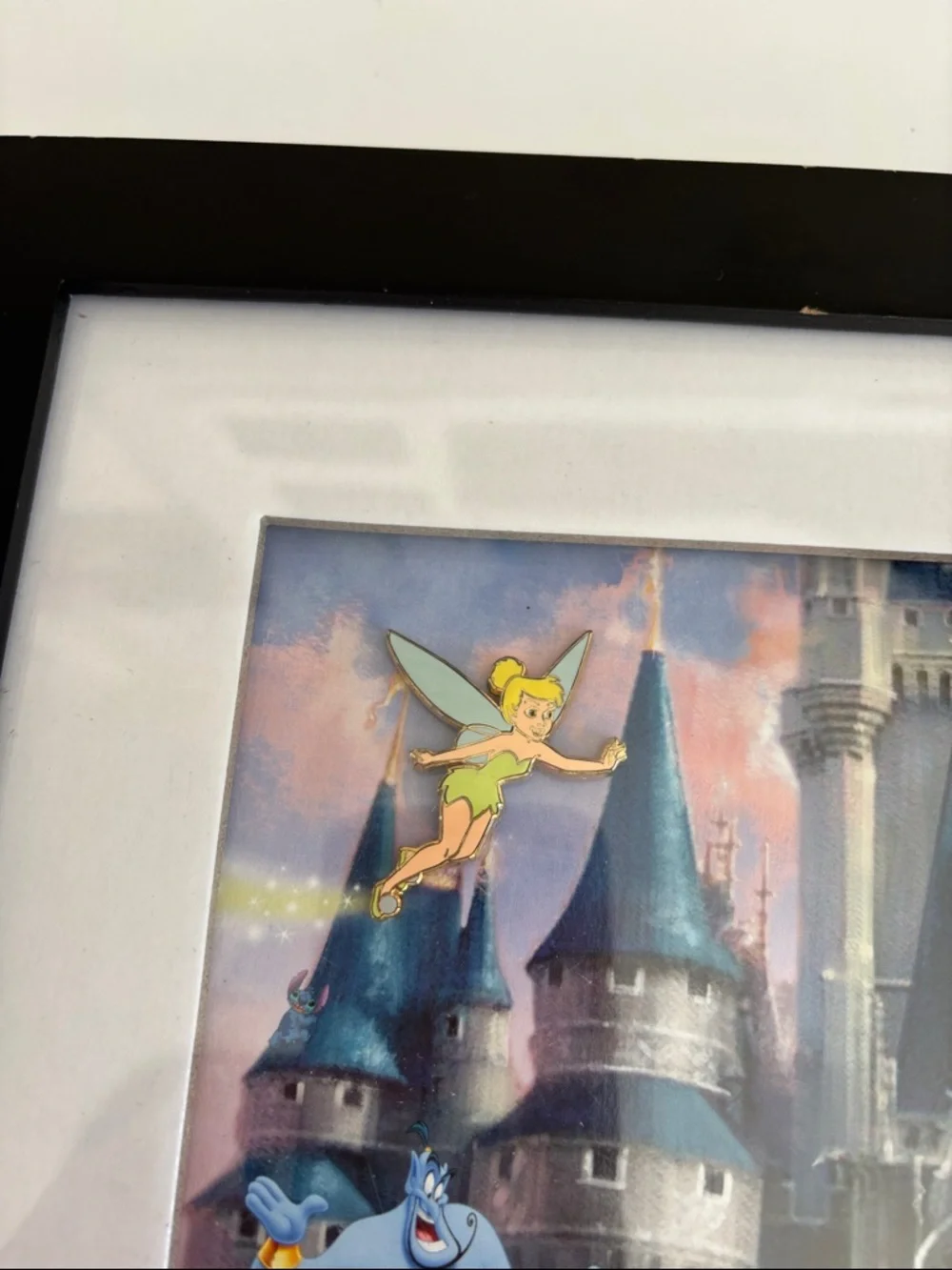 Disney Cinderella Castle lithograph print that includes four‎ collectible pins